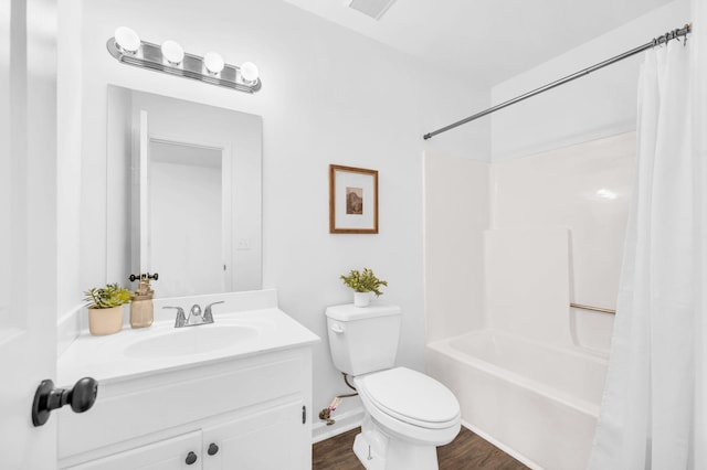 full bathroom with shower / bath combination with curtain, vanity, toilet, and hardwood / wood-style floors