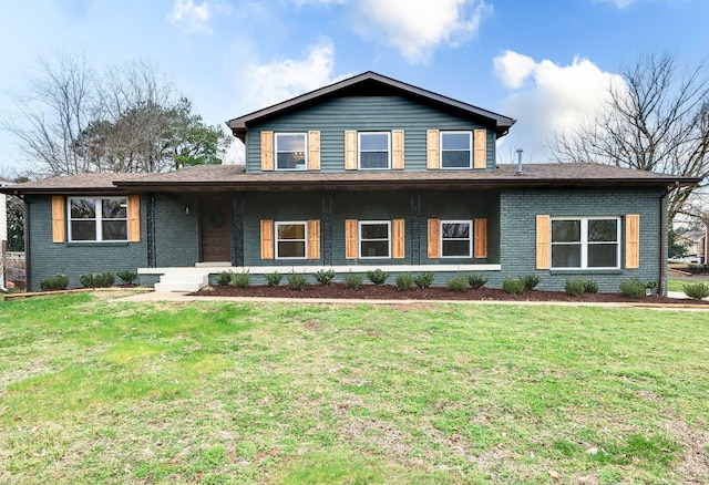 view of front facade featuring a front yard