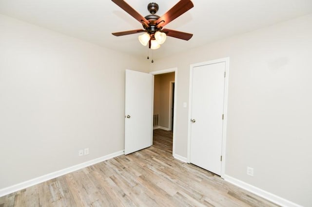 1765 Copperfield Ct, Clarksville, TN 37042 - empty room with baseboards, a ceiling fan, and light wood finished floors