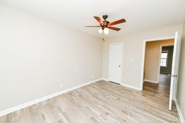 1765 Copperfield Ct, Clarksville, TN 37042 - unfurnished bedroom with light wood-style floors, baseboards, and ceiling fan
