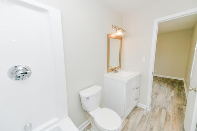 1765 Copperfield Ct, Clarksville, TN 37042 - full bath with vanity, toilet, wood finished floors, and baseboards
