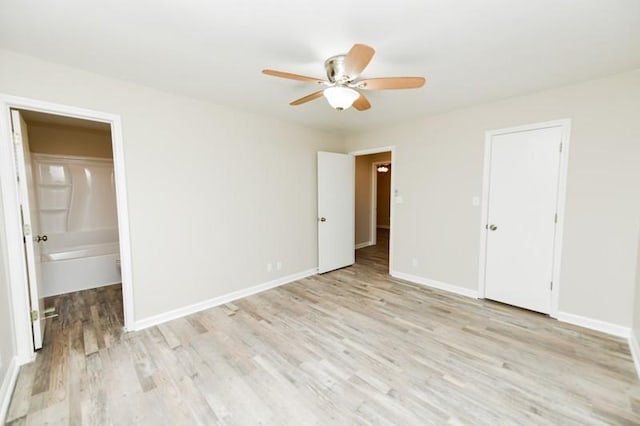 1765 Copperfield Ct, Clarksville, TN 37042 - unfurnished bedroom with baseboards, ceiling fan, ensuite bathroom, and light wood finished floors