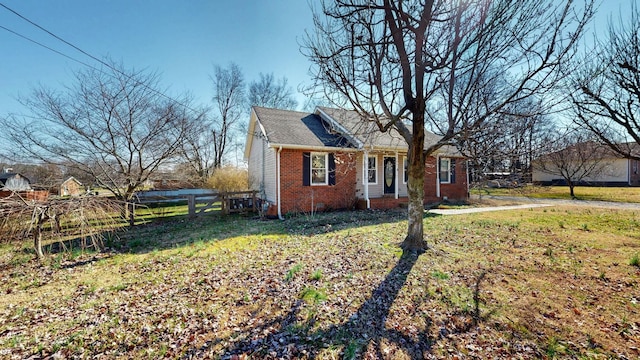 single story home with a front yard