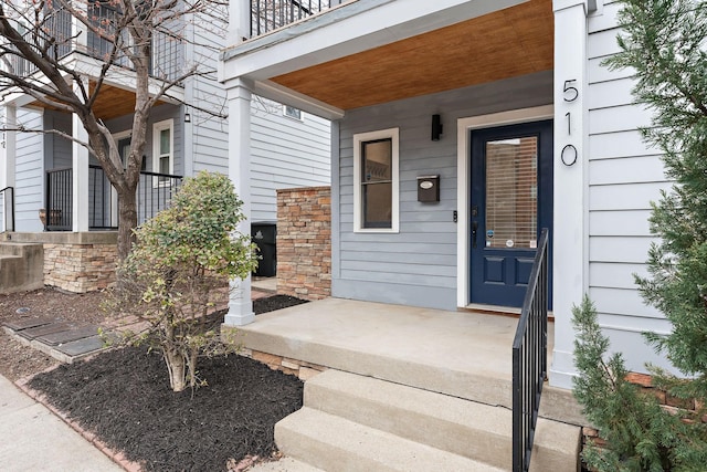 doorway to property featuring a porch