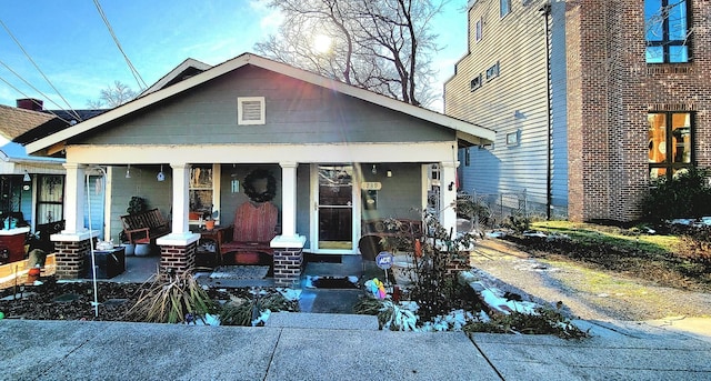 bungalow-style house with covered porch