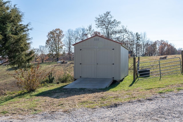 view of outdoor structure featuring a rural view