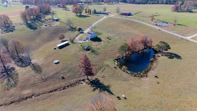 bird's eye view featuring a rural view and a water view