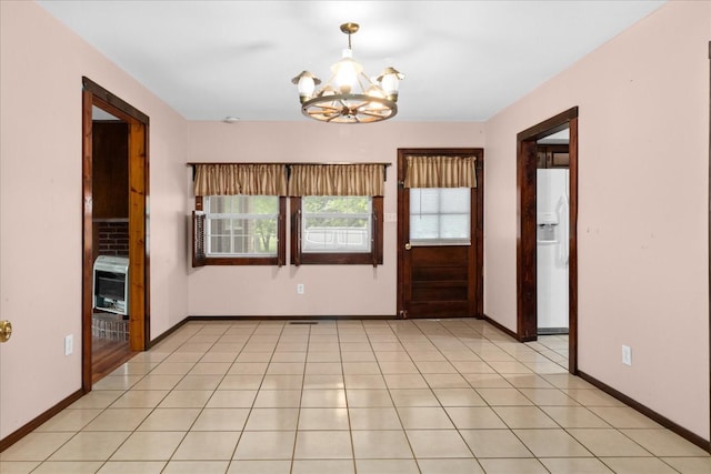 1144 Miller Rd, Lewisburg, TN 37091 - empty room featuring a chandelier and baseboards