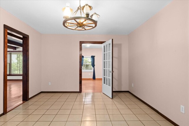1144 Miller Rd, Lewisburg, TN 37091 - spare room with a chandelier, baseboards, and light tile patterned floors