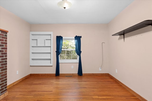 1144 Miller Rd, Lewisburg, TN 37091 - spare room featuring wood finished floors and baseboards