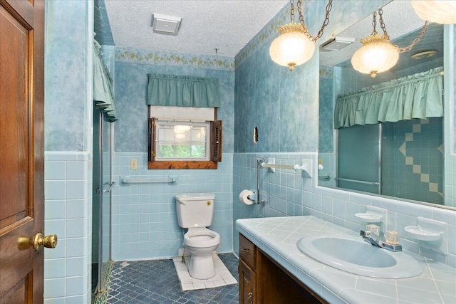 1144 Miller Rd, Lewisburg, TN 37091 - bathroom with tile patterned flooring, tile walls, toilet, a textured ceiling, and vanity
