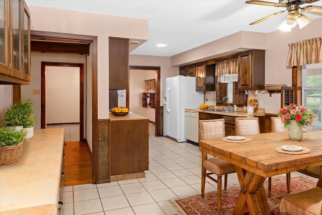 1144 Miller Rd, Lewisburg, TN 37091 - kitchen featuring white appliances, light countertops, a sink, ceiling fan, and light tile patterned flooring