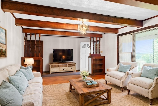 1144 Miller Rd, Lewisburg, TN 37091 - living room with wood finished floors, beamed ceiling, and a chandelier