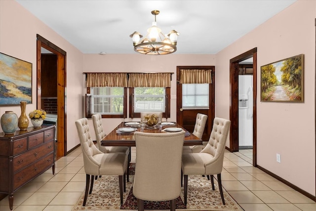 1144 Miller Rd, Lewisburg, TN 37091 - dining room featuring a chandelier, light tile patterned floors, and baseboards