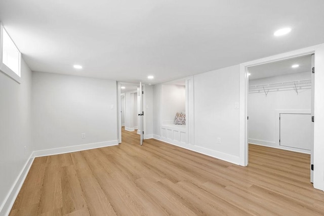 basement with light wood-type flooring