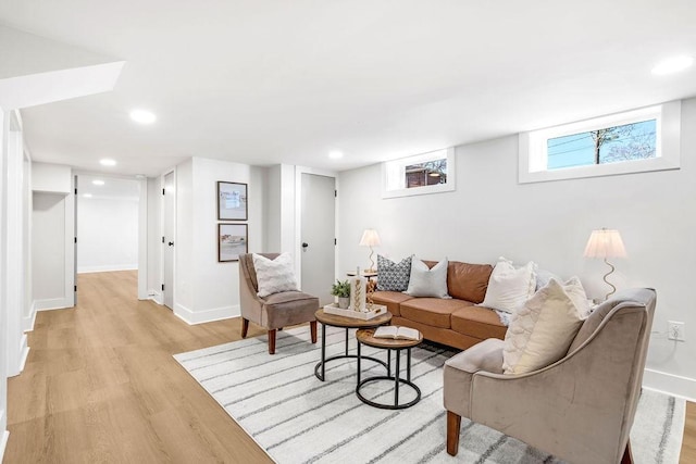 living room with light hardwood / wood-style flooring