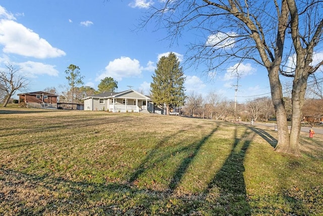 view of yard with a porch