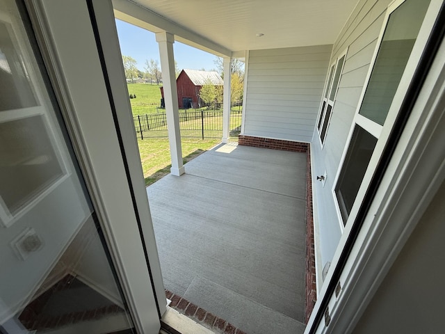 balcony featuring a porch
