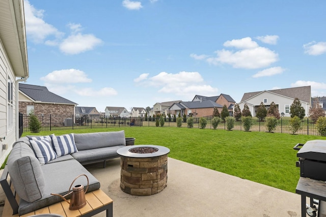 view of patio / terrace featuring an outdoor living space with a fire pit