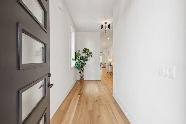 corridor featuring light wood-type flooring