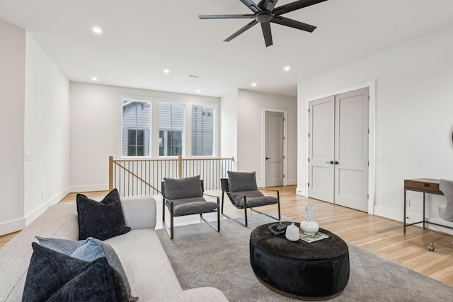 living room with light hardwood / wood-style flooring