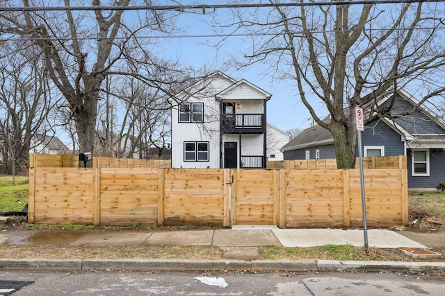 view of yard with a balcony