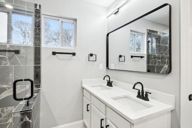 bathroom featuring vanity and a wealth of natural light