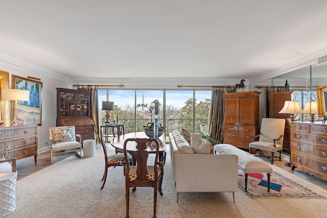 living room with crown molding and wood-type flooring