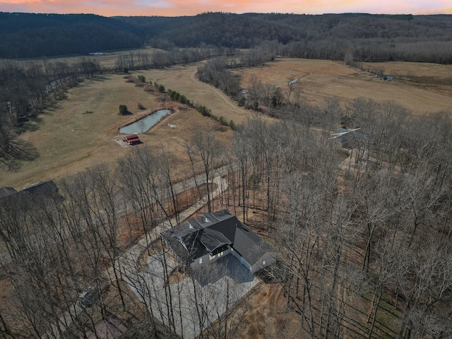 aerial view at dusk with a rural view