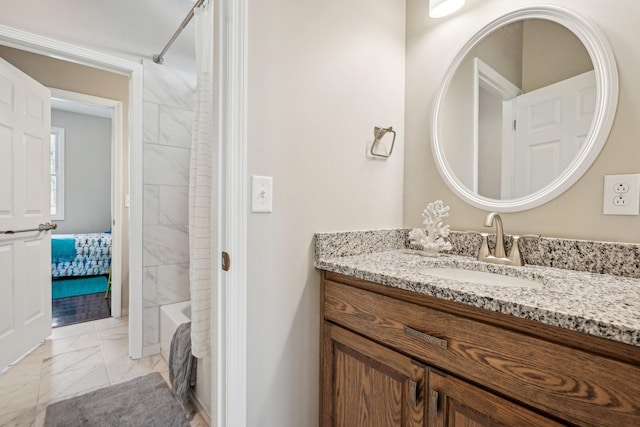 bathroom with vanity and tub / shower combination