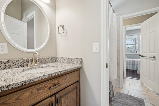 bathroom featuring vanity and shower / bath combo