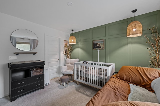 bedroom with light colored carpet