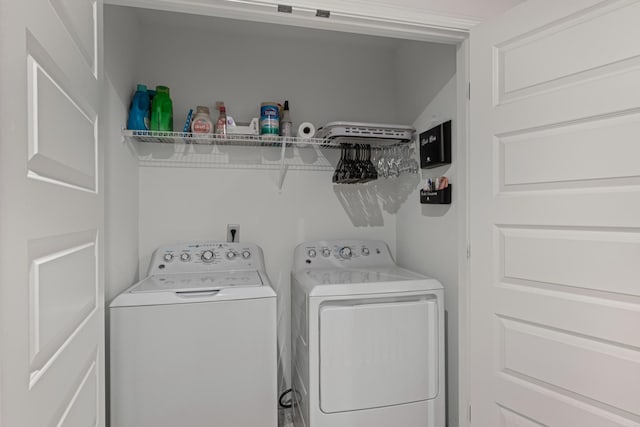 laundry area featuring separate washer and dryer