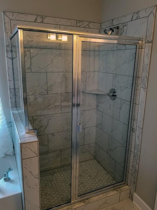 bathroom with independent shower and bath