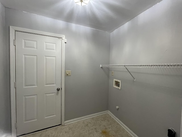 clothes washing area featuring washer hookup