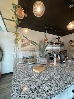 kitchen with light stone countertops