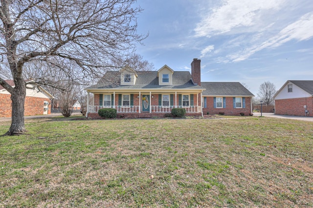 cape cod home featuring a front yard, covered porch, a chimney, crawl space, and brick siding