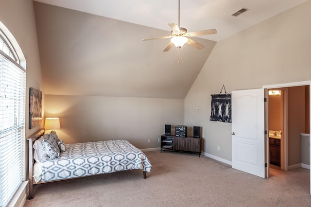 bedroom featuring multiple windows, high vaulted ceiling, ceiling fan, and carpet floors