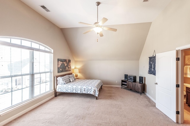 bedroom with lofted ceiling, ceiling fan, and carpet floors