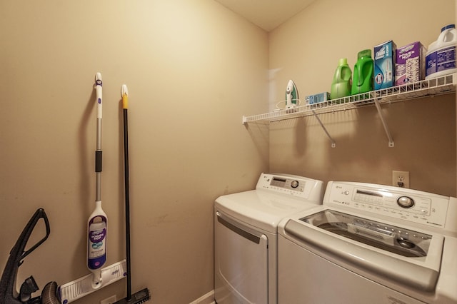 laundry room featuring separate washer and dryer