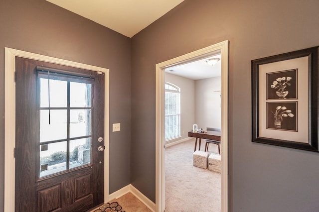 entryway with light carpet