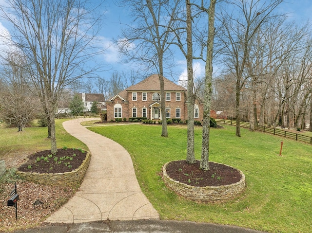 view of front of home with a front yard