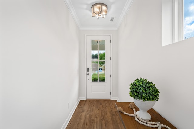 entryway featuring ornamental molding and hardwood / wood-style floors