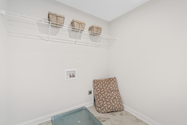 clothes washing area featuring electric dryer hookup and washer hookup