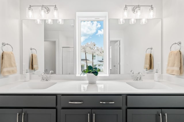 bathroom with vanity and an enclosed shower