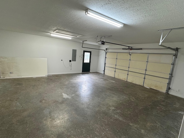 garage with electric panel and a garage door opener