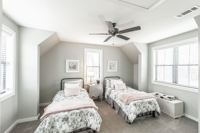 carpeted bedroom with ceiling fan and lofted ceiling