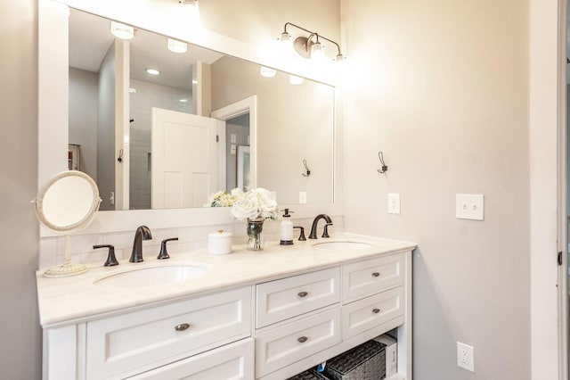 bathroom featuring vanity and walk in shower