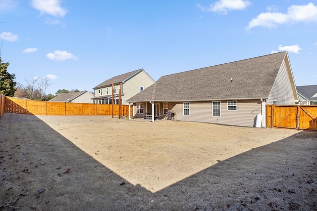 back of property featuring a patio area