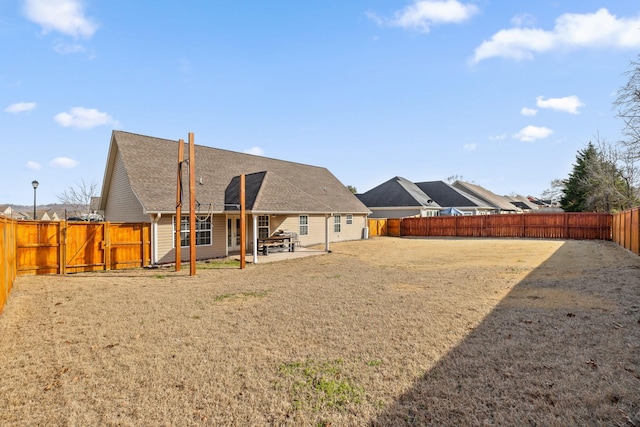 back of property featuring a patio